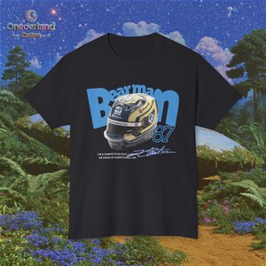 A stylish nod to a racing legend in the making! Our Oliver Bearman T-shirt, as shown in the picture, features a unique artistic portrayal of his helmet and the memorable number 87. This isn't just a shirt; it's a piece of F1 art. Made from 100% cotton, it's comfortable for all-day wear and serves as a standout gift for the motorsport fan in your life who appreciates both the sport and its history with Haas.