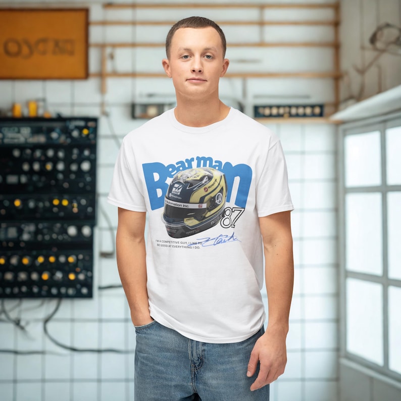 The design is a perfect tribute to the Haas driver and a must-have for any true fan. Made from soft, comfortable cotton, this shirt is an essential piece for any F1 enthusiast and a great gift for anyone who loves the thrill of the race. The quote below the graphic, which reads 'I'M A COMPETITIVE GUY, I LIKE TO BE GOOD AT EVERYTHING I DO.', adds a powerful message of determination. This soft cotton shirt is an excellent addition to any F1 enthusiast's collection