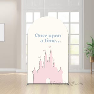 May include: An arched backdrop with a cream background. It features a pink castle silhouette and the text "Once upon a time..." in light blue. The bottom right corner has the text "Deep Art Leon".