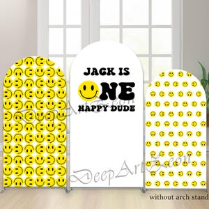 May include: Three white arch-shaped backdrops. Two backdrops feature a repeating pattern of yellow smiley faces. The centre backdrop has the text "JACK IS ONE HAPPY DUDE" with a yellow smiley face.