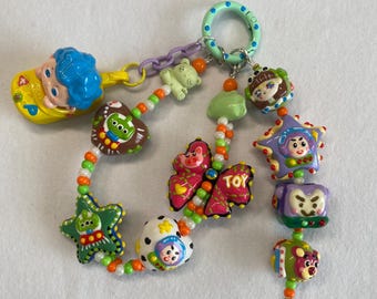 Toy Story themed keychain with clay painted beads
