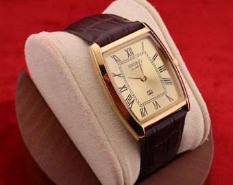 Vintage seltene Seiko Männer Barrel-Tank Quarz-Gold-Zifferblatt dunkelbraune Lederarmbanduhr