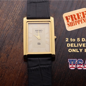 Rare Vintage Seiko Slim tank Men White Dial Black Strap Formal Dress watch