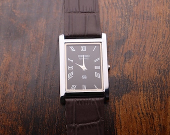Vintage Seiko Tank Watch: Slim Black Dial, Brown Leather Strap
