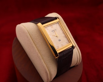 Vintage zeldzame Seiko slanke quartz heren gouden wijzerplaat donkerbruin leren dresswatch