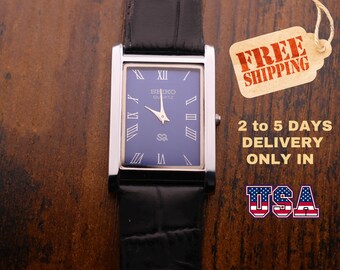 Rare Vintage Seiko Slim tank Men Blue Dial Black Strap Formal Dress watch