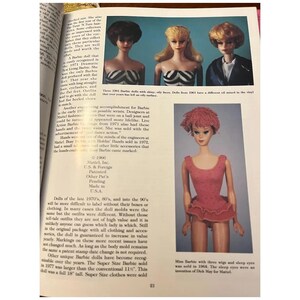 May include: A page from a book featuring images of vintage Barbie dolls. Three dolls are shown with different hairstyles and outfits. Another doll is shown wearing a pink dress with a ruffled skirt. Text accompanies the images.
