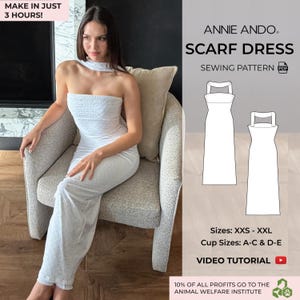 May include: A white strapless dress with a textured eyelet pattern and a matching neck scarf. The image includes text reading ANNIE ANDO SCARF DRESS SEWING PATTERN PDF, sizes XXS-XXL, cup sizes A-C and D-E, and a video tutorial icon.