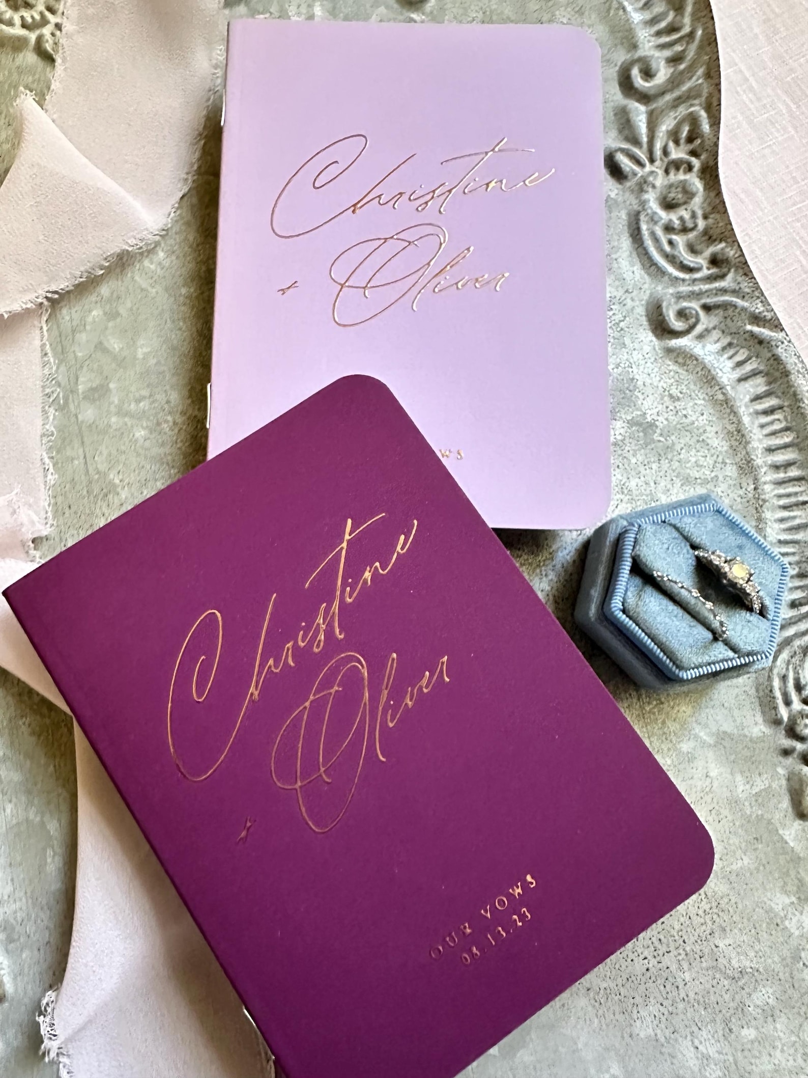 Purple-themed wedding ceremony supplies - purple His and Her vow books