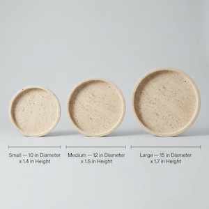 Size chart comparing small, medium, and large round travertine trays with dimensions