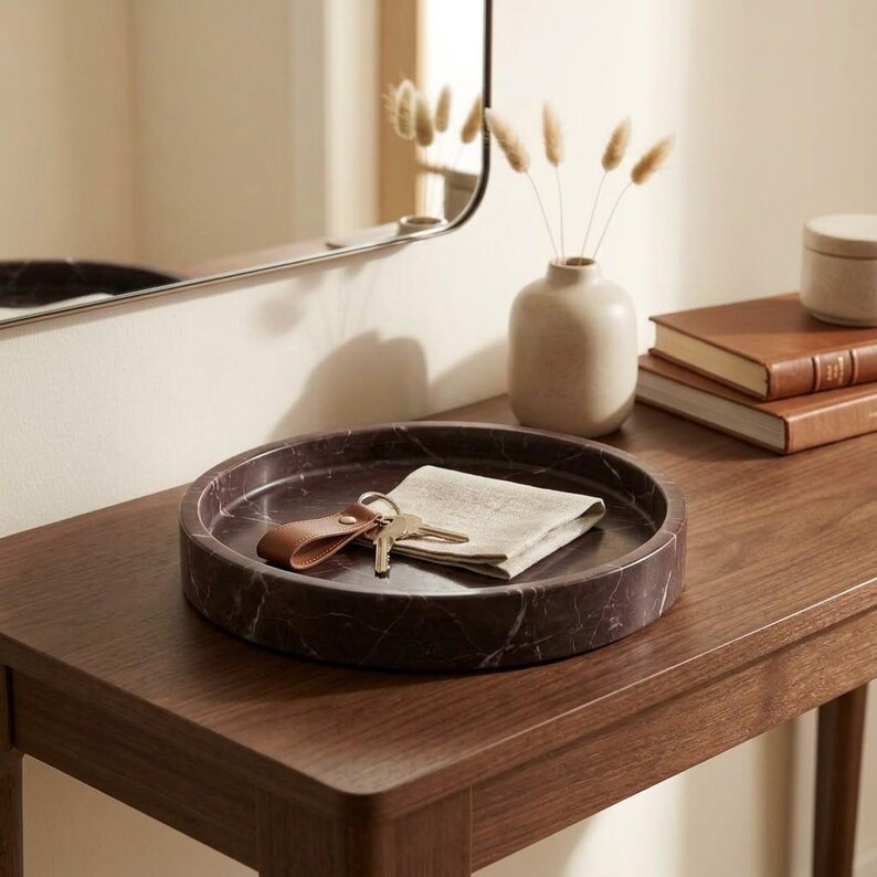 Rosso levanto marble tray styled on entryway console table holding keys and keychain