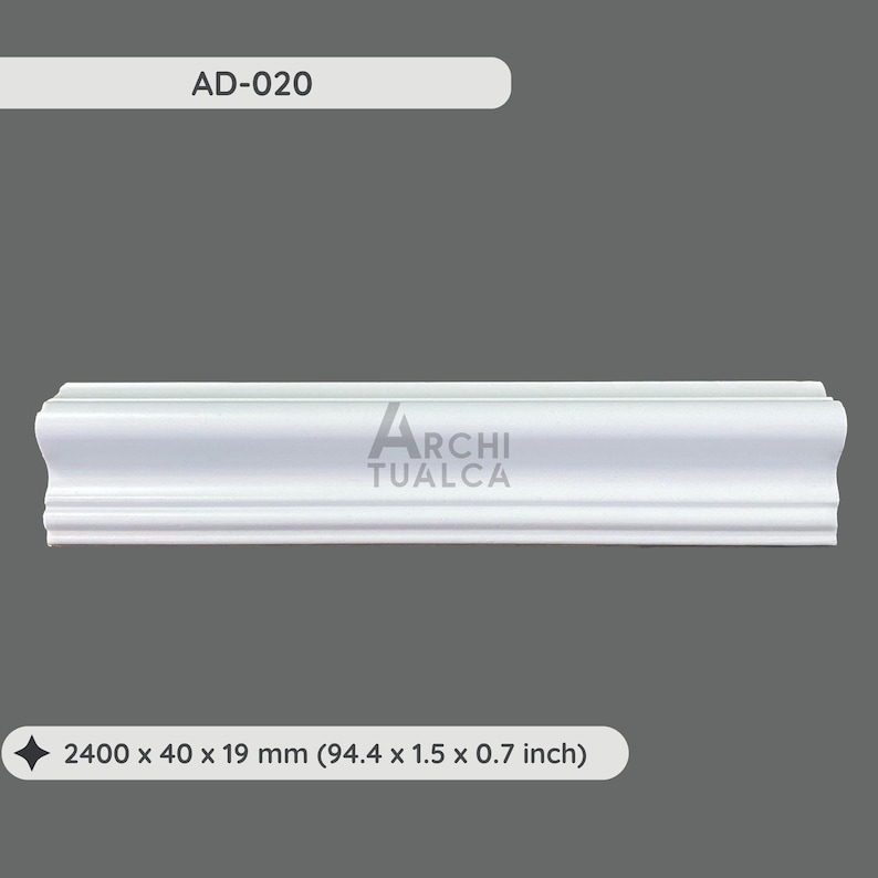 May include: White crown molding with the text "ARCHI TUALCA" and "AD-020". The molding measures 94.4 inches long, 1.5 inches wide, and 0.7 inches thick. The molding has a decorative, curved design.