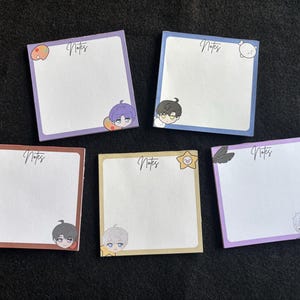 May include: Five square sticky note pads with different colored borders. Each pad has the word "Notes" in cursive and a cartoon character illustration. The borders are purple, blue, brown, yellow, and purple. The illustrations include a bear, a star, and anime-style characters.