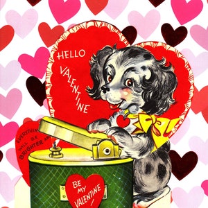 May include: Vintage Valentine's Day card featuring a dog with a yellow bow tie, holding a heart. The card has a green container with a heart that says "Be My Valentine". The background is a pattern of hearts.