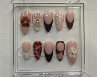 Brown and white, press on nails.