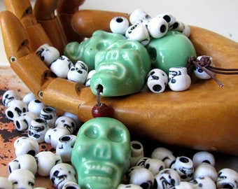 Destash skull bead lot, 87 black and white acrylic, and 4 large green ceramic skulls, craft jewelry supplies