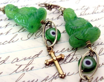 Christian Buddhist earrings, long jade green sitting Buddhas, handmade amulet, yoga jewelry, evil eye cross talisman