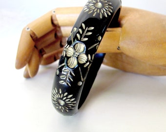 Bohemian black bangle bracelet, carved vintage plastic Bakelite, Lucite, Catalin,  with gold wash