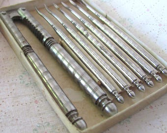 Mid century nutcracker, 7 piece set with picks, Henry Quackenbush HMQ, in original box