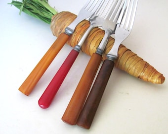 Bakelite dinner forks, 4 pieces assorted, butterscotch, brown, red handles