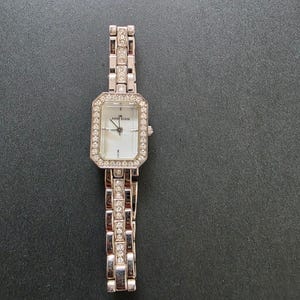 Anne Klein Womens Silver-Tone Watch With Crystal Accents & Mother-Of-Pearl Dial