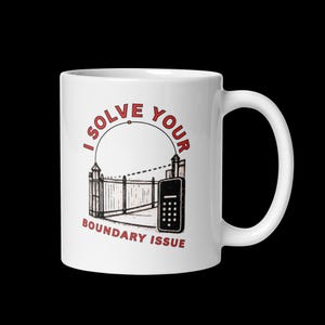 May include: A white ceramic mug featuring a graphic illustration of a gate and a keypad with the red text I SOLVE YOUR BOUNDARY ISSUE arched above and below the image. The design includes a dotted line extending from the gate to the keypad.