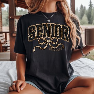 Senior 2027 Shirt Women,Leopard Bow Varsity Senior Est 2027 Tee, Class of 2027 Graduation Gift, Cute Senior Year Shirt for Her image 4