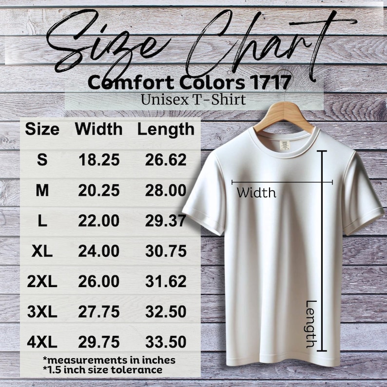 Puede incluir: Una camiseta unisex blanca Comfort Colors 1717 en una percha de madera. La imagen incluye una tabla de tallas con medidas en pulgadas para las tallas S a 4XL. La tabla muestra el ancho y el largo de las camisetas, con una tolerancia de talla de 1,5 pulgadas.