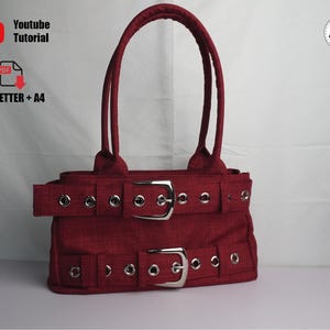 May include: A burgundy handbag with two silver buckles and matching grommets. The bag has two handles and a rectangular shape. The text "Youtube Tutorial" and "US_LETTER + A4" are visible in the image.
