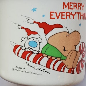 Vintage EUC Ziggy Cartoon Enamel Metal Tin Mug Cup Merry Christmas Everything Sled Riding Filled With Love Stocking Tom Wilson Candle Holder