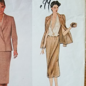May include: A vintage Vogue American Designer sewing pattern featuring a woman in a tan skirt suit and a drawing of a woman in a tan skirt suit with a jacket. The pattern is labeled "JOHN ANTHONY" and includes the number "2219".