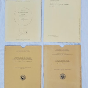 May include: A set of three ceramic mugs with a speckled, matte finish. The mugs are in shades of cream, light gray, and dark gray. Each mug has a simple, minimalist design, perfect for coffee or tea.