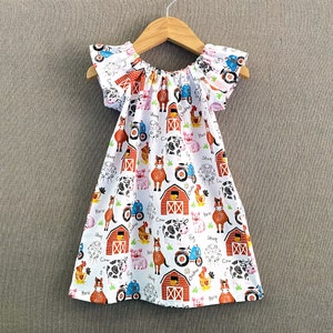 New! Girls Farm Animals Dress with Flutter Sleeves, Cotton Peasant Dress with Cow, Horse & Pig, Pullover Frock in a Barnyard Print, 12m - 10