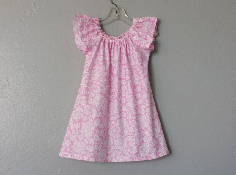 white and pink frock