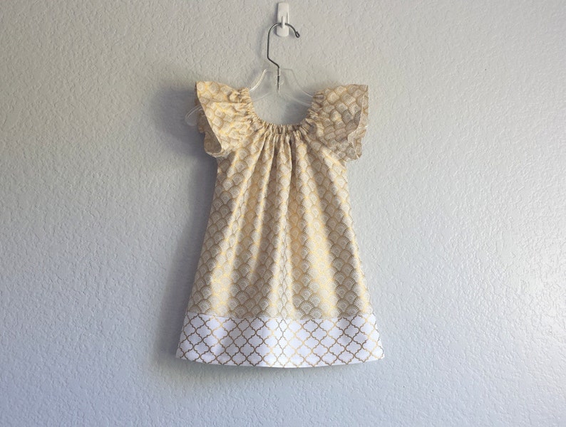 white and gold occasion dress