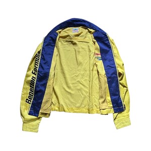 May include: A yellow and blue vintage jacket with the text "Benetton Formula" on the left sleeve.