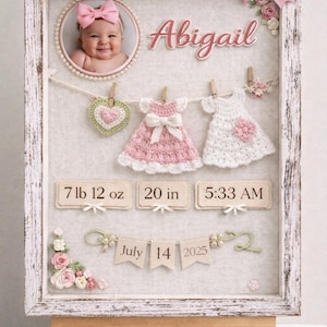 May include: A framed baby announcement featuring a baby's photo with a pink bow. The frame displays the name "Abigail", crochet dresses, and birth details: 3.5 kg, 50.8 cm, and 5:33 AM. The date July 14, 2025 is also included.