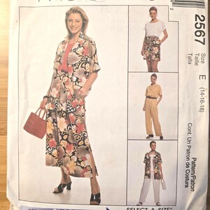 May include: A McCall's sewing pattern envelope for model 2567, size E (14-16-18). The front displays illustrations of various clothing combinations including a floral print shirt and skirt, a solid color jumpsuit, and a floral shirt with white pants.
