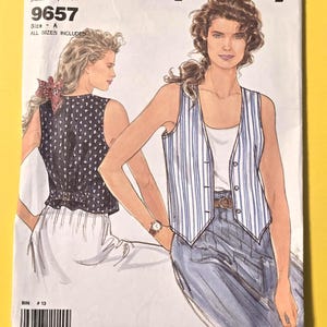 May include: Simplicity sewing pattern 9657, featuring illustrations of two vest designs. The pattern includes all sizes and is labeled "It's so easy." The cover art showcases a woman wearing a striped vest and another in a dotted vest.