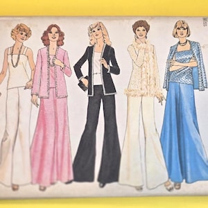 May include: A set of three ceramic mugs with a speckled, matte finish. Each mug features a different color: light blue, cream, and gray. The mugs have a simple, modern design with a rounded shape and a comfortable handle.