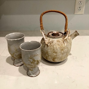 Vintage Handcrafted Studio Pottery Teapot, Shino Glaze & Bamboo Handle, with pair of chalices / goblets, NOTE One goblet has a crack