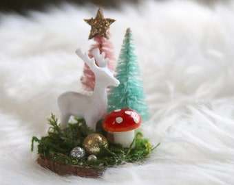 Darling 2&quot; x  2.5&quot; miniature winter scene w/an white deer, moss, mushroom & brush trees w/ a glittered star all on a beautiful wood slice.