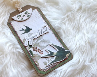 Large handmade Christmas gift tag. Featuring a 3D gorgeous bird and Joyeux Noel all trimmed w/ hand glittering & hand crinkled seam binding