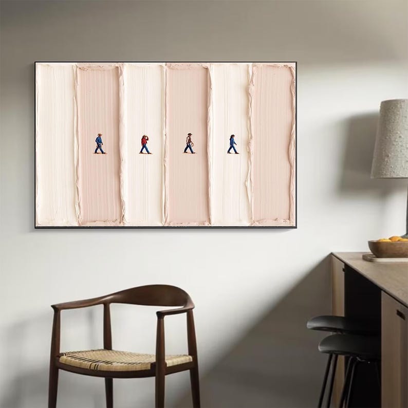 May include: Abstract wall art featuring four figures walking across a textured, vertical background of alternating light and medium beige tones. The figures are dressed in various colors, adding a pop of contrast to the neutral palette.