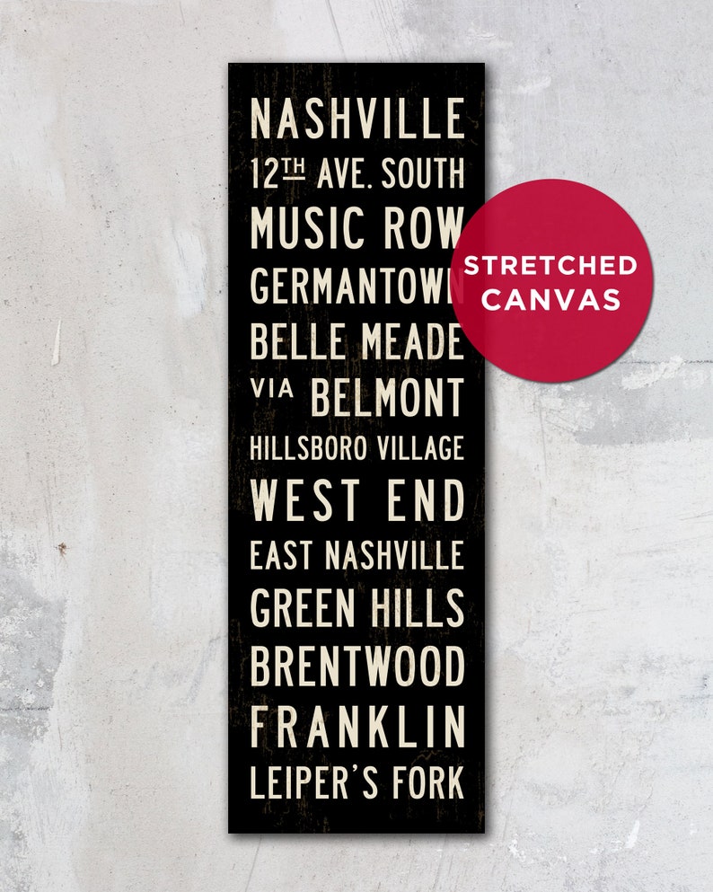 May include: Black and white sign with the text "NASHVILLE" and a list of neighborhoods in Nashville, Tennessee. The sign is on a stretched canvas.