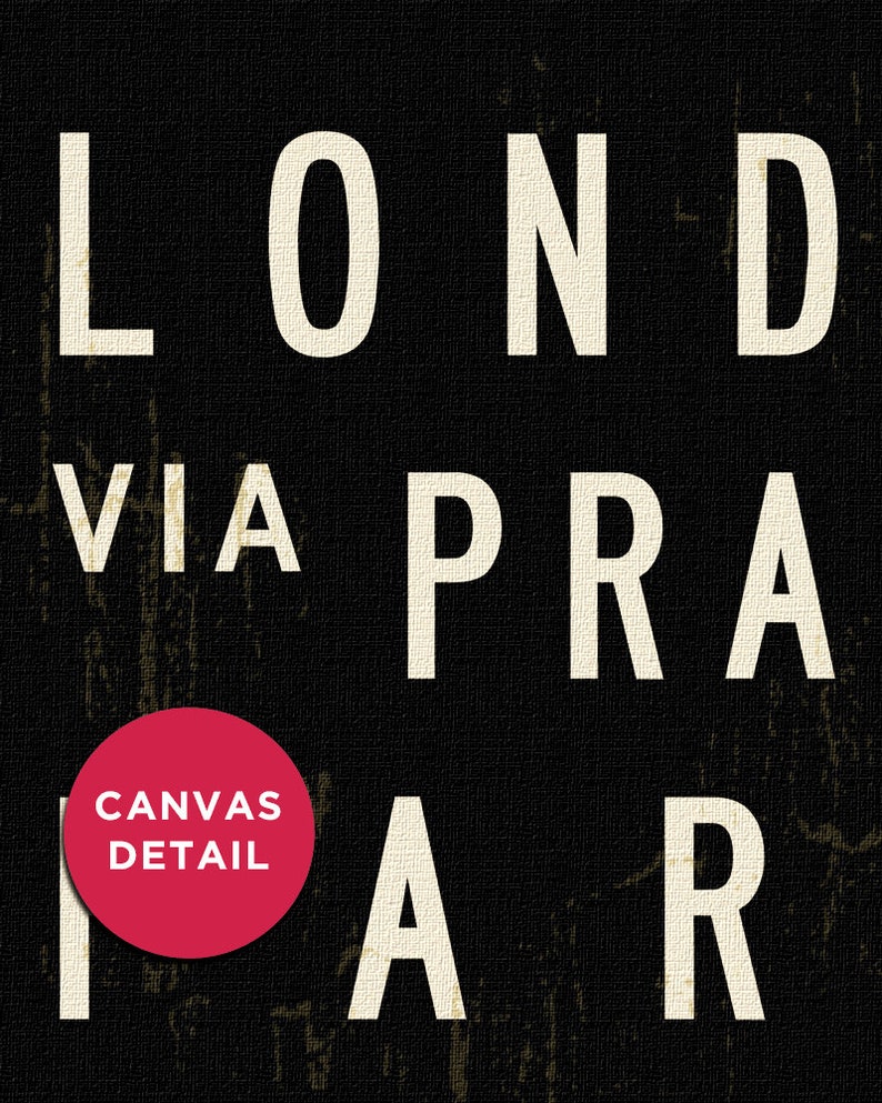 May include: Black and white typography art print with the words "LONDON VIA PRAIAR" in a bold, sans-serif font. The word "PRAIAR" is partially obscured by a red circle with the text "CANVAS DETAIL" in white.