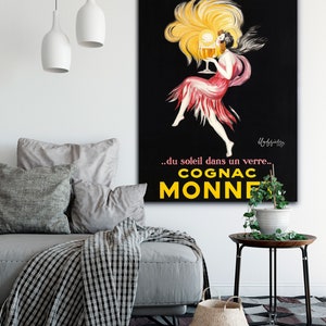 A vintage poster advertising Cognac Monnet from Transit Design. The poster says '...du soleil dans un verre... Cognac Monnet.'