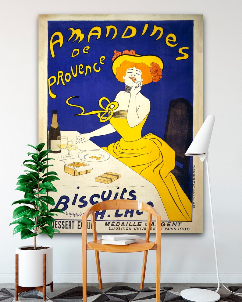 Vintage canvas wall art from Transit Design. An Art Nouveau Poster by Leonetto Cappiello featuring an advertisement for 'Amandines de Provence' biscuits.