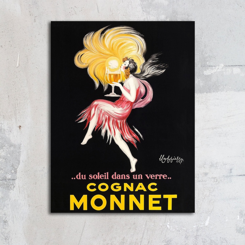 A reproduction print of a vintage advertising poster by Leonetto Cappiello from Transit Design. The advertisement if for Cognac Monnet.