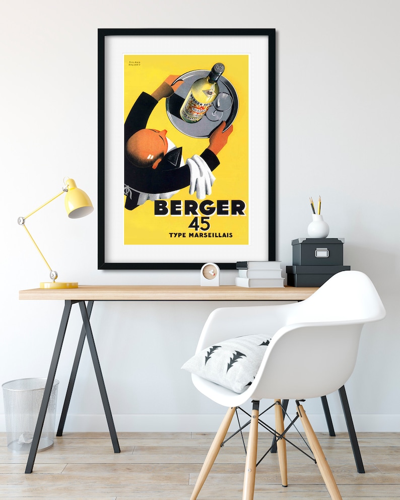 May include: A vintage poster advertising Berger 45 Type Marseillais, a brand of liquor. The poster features a waiter holding a tray with a bottle of liquor and glasses. The background is yellow.